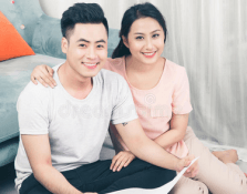 Asian man and woman together as couple